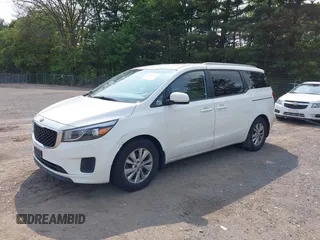 2016 Kia Sedona LX z VIN KNDMB5C16G6125279, wystawiony jako IAAI lot #42477509 z przebiegiem 114 430 mil mil oraz . Historia ofert i sprzedaży dostępna na DreamBid. Obrazek 2.