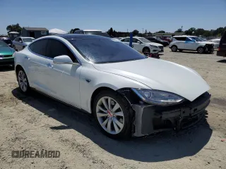 2014 Tesla Model S 60 with VIN 5YJSA1H19EFP58677, listed as a Copart auction lot 61446345 with 150,152 mi miles and Salvage title. Bid and sale history available at DreamBid. Image 4.