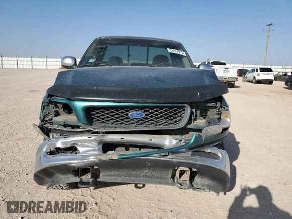 1997 Ford F-150 XL with VIN 1FTDF08W6VKC33983, listed as a Copart auction lot 51297975 with 187,657 mi miles and Salvage Title. Bid and sale history available at carsss.com. Image 5.
