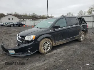2019 Dodge Grand Caravan SXT with VIN 2C4RDGCG4KR580424, listed as a Copart auction lot 52715245 with 130,696 mi miles and Salvage Title. Bid and sale history available at DreamBid. Image 1.