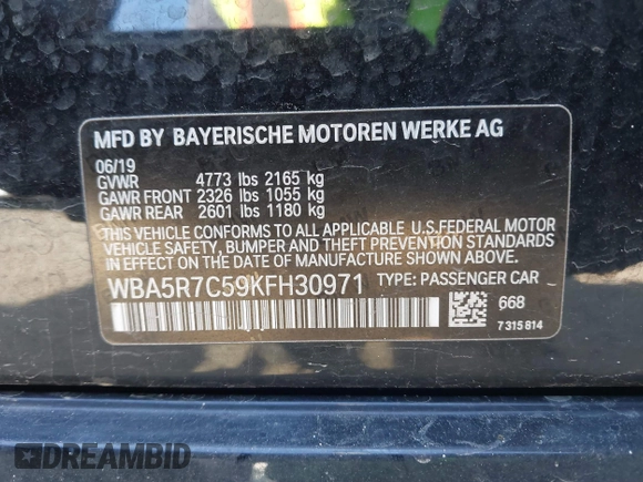 2019 BMW 3 Series 330i xDrive with VIN WBA5R7C59KFH30971, listed as a IAAI auction lot 42005244 with 59,514 mi miles and . Bid and sale history available at DreamBid. Image 9.