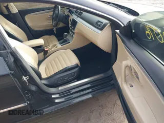 2014 Volkswagen CC Sport with VIN WVWBP7AN4EE534247, listed as a IAAI auction lot 41542076 with 119,199 mi miles and . Bid and sale history available at DreamBid. Image 5.