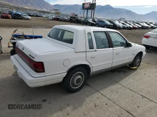 1994 Chrysler LeBaron z VIN 3C3AA563XRT225465, wystawiony jako Copart lot #78666144 z przebiegiem 87 254 mil mil oraz Tytuł czysty. Historia ofert i sprzedaży dostępna na DreamBid. Obrazek 3.