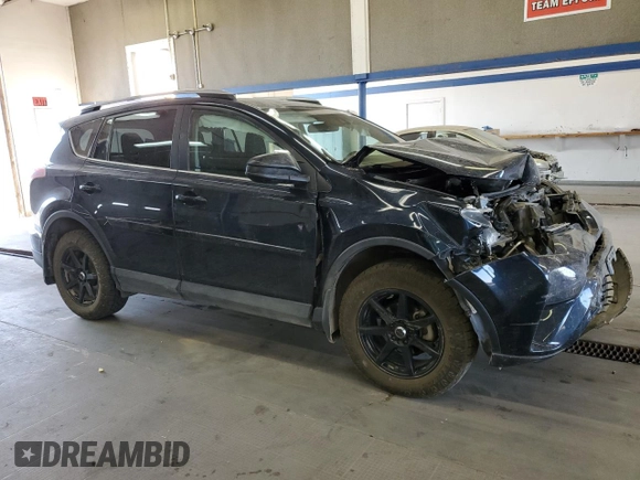 2017 Toyota RAV4 LE with VIN 2T3BFREVXHW578209, listed as a Copart auction lot 64029745 with 51,803 mi miles and Salvage title. Bid and sale history available at DreamBid. Image 4.