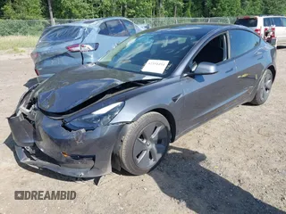 2023 Tesla Model 3 with VIN 5YJ3E1EA0PF473754, listed as a IAAI auction lot 42351494 with Not provided miles and . Bid and sale history available at DreamBid. Image 2.