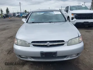 1999 Nissan Altima XE with VIN 1N4DL01DXXC132336, listed as a IAAI auction lot 41926059 with 212,798 mi miles and . Bid and sale history available at carsss.com. Image 13.