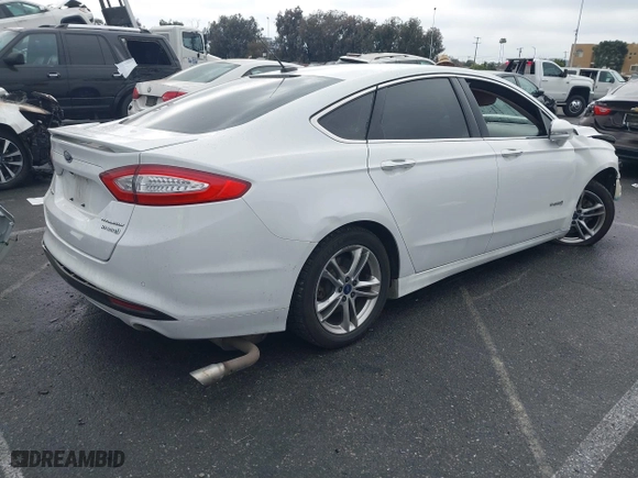 2015 Ford Fusion Titanium Hybrid with VIN 3FA6P0RU3FR247118, listed as a IAAI auction lot 41210219 with 143,348 mi miles. Bid and sale history available at carsss.com. Image 4.