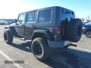 2010 Jeep Wrangler Unlimited Sahara with VIN 1J4HA5H16AL215659, listed as a IAAI auction lot 41749218 with 55,544 mi miles. Bid and sale history available at carsss.com. Image 3.