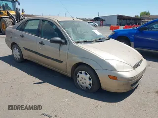 2000 Ford Focus LX with VIN 1FAFP33P2YW427999, listed as a IAAI auction lot 42874144 with 121,885 mi miles and . Bid and sale history available at DreamBid. Image 1.