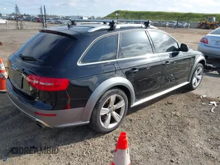 2014 Audi allroad Premium Plus with VIN WA1UFAFLXEA020789, listed as a IAAI auction lot 41959838 with 133,520 mi miles. Bid and sale history available at carsss.com. Image 4.