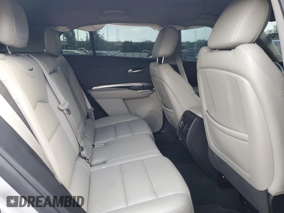 2019 Cadillac XT4 FWD Luxury z VIN 1GYAZAR42KF119510, wystawiony jako Copart lot #48979395 z przebiegiem 57 498 mil mil oraz Szkoda całkowita • Salvage title. Historia ofert i sprzedaży dostępna na DreamBid. Obrazek 11.