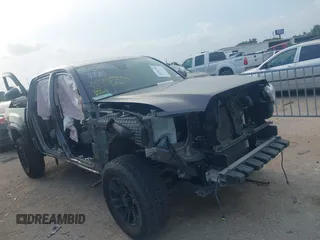 2022 Toyota Tacoma SR with VIN 3TYAX5GN1NT065687, listed as a IAAI auction lot 42153768 with 33,414 mi miles and . Bid and sale history available at DreamBid. Image 1.