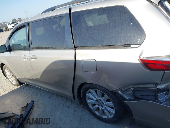 2015 Toyota Sienna XLE with VIN 5TDYK3DC0FS632909, listed as a IAAI auction lot 42012143 with 97,084 mi miles and . Bid and sale history available at DreamBid. Image 15.