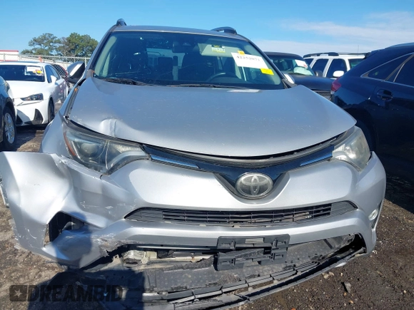 2018 Toyota RAV4 XLE with VIN 2T3WFREV6JW442859, listed as a IAAI auction lot 42252071 with 67,749 mi miles and . Bid and sale history available at DreamBid. Image 12.