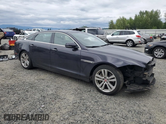 2016 Jaguar XJ Portfolio with VIN SAJWJ2GDXG8V93228, listed as a Copart auction lot 62832115 with 45,536 mi miles and Salvage title. Bid and sale history available at DreamBid. Image 4.