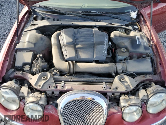 2000 Jaguar S-Type V8 z VIN SAJDA01D7YGL57521, wystawiony jako Copart lot #84539364 z przebiegiem Nie podano mil oraz Szkoda całkowita • Salvage title. Historia ofert i sprzedaży dostępna na DreamBid. Obrazek 11.