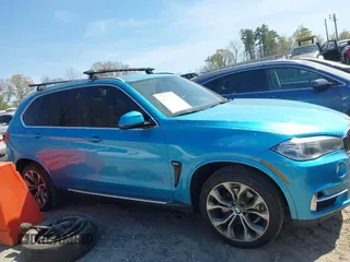 2015 BMW X5 sDrive35i z VIN 5UXKR2C55F0H35794, wystawiony jako IAAI lot #41898741 z przebiegiem 223 710 mil mil oraz . Historia ofert i sprzedaży dostępna na DreamBid. Obrazek 13.