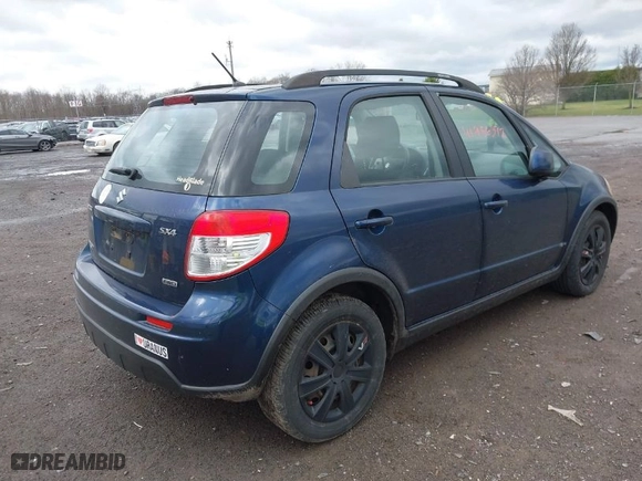2010 Suzuki SX4 with VIN JS2YB5A37A6300142, listed as a IAAI auction lot 41956392 with 91,808 mi miles. Bid and sale history available at carsss.com. Image 4.