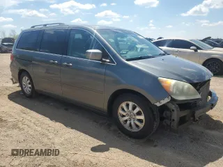 2008 Honda Odyssey EX-L z VIN 5FNRL38748B408516, wystawiony jako Copart lot #55394745 z przebiegiem 144 176 mil mil oraz Szkoda całkowita • Salvage title. Historia ofert i sprzedaży dostępna na DreamBid. Obrazek 4.