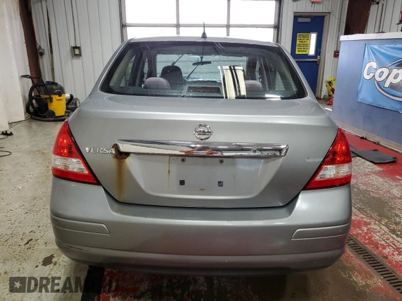 2009 Nissan Versa S with VIN 3N1BC11E29L445486, listed as a Copart auction lot 51532695 with Not Provided miles and Salvage Title. Bid and sale history available at DreamBid. Image 6.