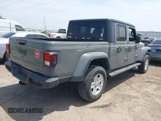2021 Jeep Gladiator Sport S z VIN 1C6JJTAG9ML538769, wystawiony jako IAAI lot #42078142 z przebiegiem 49 924 mil mil oraz . Historia ofert i sprzedaży dostępna na DreamBid. Obrazek 4.