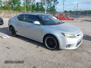 2012 Scion tC with VIN JTKJF5C72C3037233, listed as a IAAI auction lot 41972620 with 229,001 mi miles. Bid and sale history available at carsss.com. Image 1.