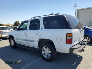 2004 GMC Yukon SLE with VIN 1GKEK13T54J168734, listed as a Copart auction lot 71235204 with 174,429 mi miles and Salvage Title. Bid and sale history available at carsss.com. Image 2.