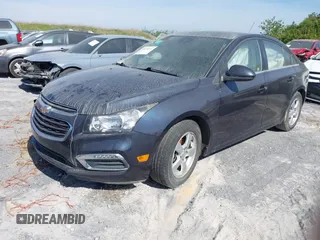2015 Chevrolet Cruze LT with VIN 1G1PC5SB7F7264617, listed as a IAAI auction lot 40638097 with 103,241 mi miles and . Bid and sale history available at DreamBid. Image 2.