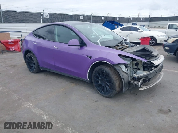 2021 Tesla Model Y Long Range with VIN 5YJYGDEE7MF224531, listed as a IAAI auction lot 38454442 with 52,408 mi miles. Bid and sale history available at carsss.com. Image 1.