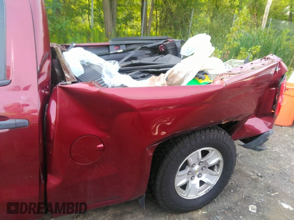 2014 Chevrolet Silverado 1500 LT with VIN 1GCVKREH7EZ166876, listed as a IAAI auction lot 39990367 with 126,326 mi miles and . Bid and sale history available at DreamBid. Image 6.