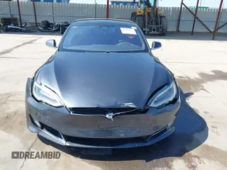 2017 Tesla Model S 100D with VIN 5YJSA1E29HF204881, listed as a IAAI auction lot 41785767 with 146,523 mi miles and . Bid and sale history available at DreamBid. Image 12.