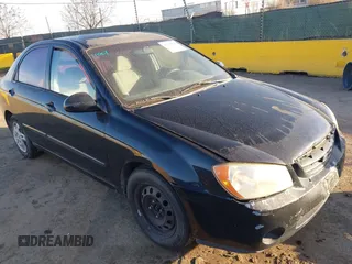 2004 Kia Spectra LX with VIN KNAFE122745033048, listed as a IAAI auction lot 41234181 with 157,410 mi miles. Bid and sale history available at carsss.com. Image 1.