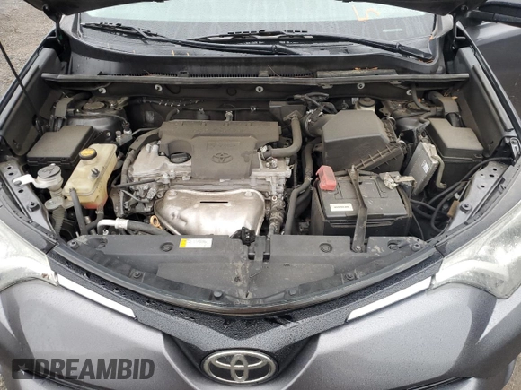 2018 Toyota RAV4 XLE with VIN 2T3WFREV0JW445322, listed as a Copart auction lot 55623845 with 116,700 mi miles and Salvage title. Bid and sale history available at DreamBid. Image 12.