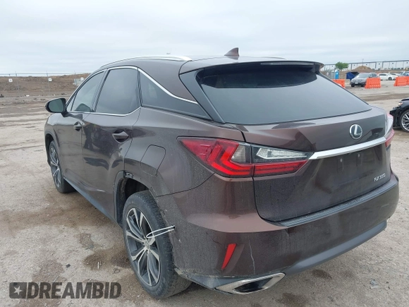 2016 Lexus RX 350 z VIN 2T2ZZMCA5GC029529, wystawiony jako IAAI lot #41953567 z przebiegiem 133 460 mil mil oraz . Historia ofert i sprzedaży dostępna na DreamBid. Obrazek 3.