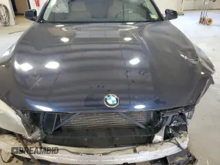 2011 BMW 7 Series 740i with VIN WBAKA4C53BC392488, listed as a Copart auction lot 77876674 with 0 mi miles and Salvage Title. Bid and sale history available at carsss.com. Image 12.
