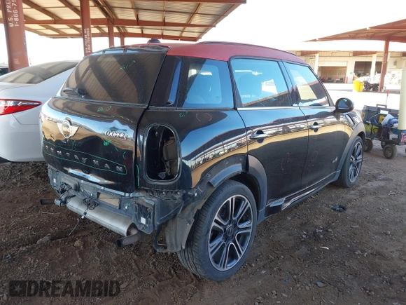 2014 MINI Countryman S with VIN WMWZC5C57EWP39919, listed as a IAAI auction lot 41613909 with 139,138 mi miles and . Bid and sale history available at DreamBid. Image 4.