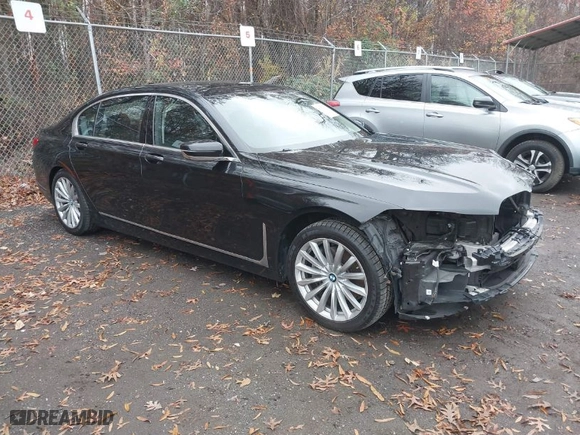 2020 BMW 7 Series 740i xDrive with VIN WBA7T4C03LGF97312, listed as a IAAI auction lot 40970033 with 60,231 mi miles. Bid and sale history available at carsss.com. Image 1.