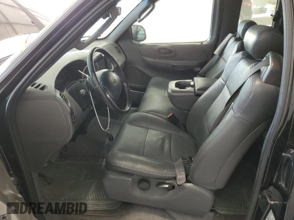 2002 Ford F-150 XL with VIN 2FTRX07W72CA71544, listed as a Copart auction lot 81628694 with 313,663 mi miles and Salvage title. Bid and sale history available at DreamBid. Image 7.