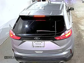 2020 Ford Edge Titanium with VIN 2FMPK3K95LBA30678, listed as a IAAI auction lot 42714178 with 60,935 mi miles and . Bid and sale history available at DreamBid. Image 2.