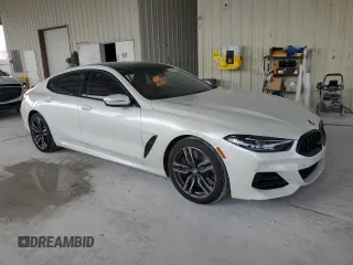 2023 BMW 8 Series 840i with VIN WBAGV4C00PCL13414, listed as a Copart auction lot 51512755 with 23,133 mi miles and Salvage title. Bid and sale history available at DreamBid. Image 4.