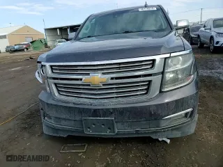 2015 Chevrolet Suburban LTZ with VIN 1GNSKKKCXFR722917, listed as a Copart auction lot 46176815 with 116,660 mi miles and Salvage Title. Bid and sale history available at carsss.com. Image 12.