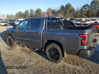 2023 Nissan Frontier SV z VIN 1N6ED1EK7PN672948, wystawiony jako Copart lot #45247705 z przebiegiem 13 031 mil mil oraz Szkoda całkowita • Salvage title. Historia ofert i sprzedaży dostępna na DreamBid. Obrazek 2.