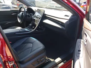 2020 Toyota Avalon Hybrid XLE z VIN 4T1J21FB6LU012708, wystawiony jako IAAI lot #42213957 z przebiegiem 60 295 mil mil oraz . Historia ofert i sprzedaży dostępna na DreamBid. Obrazek 5.