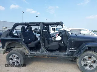 2016 Jeep Wrangler Unlimited Sahara with VIN 1C4BJWEG8GL333876, listed as a IAAI auction lot 42314351 with 163,889 mi miles and . Bid and sale history available at DreamBid. Image 13.