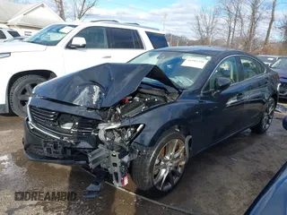 2016 Mazda 6 i Grand Touring with VIN JM1GJ1W54G1454115, listed as a IAAI auction lot 41203298 with 104,632 mi miles and . Bid and sale history available at DreamBid. Image 18.
