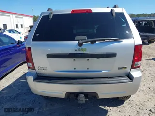 2007 Jeep Grand Cherokee Laredo with VIN 1J8HR48P87C687411, listed as a IAAI auction lot 41774029 with 212,763 mi miles. Bid and sale history available at carsss.com. Image 17.