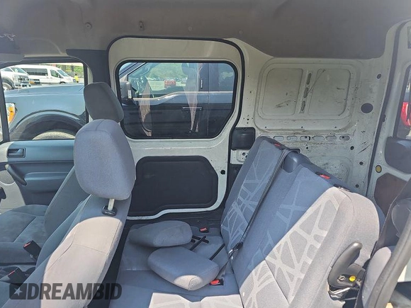2010 Ford Transit Connect z VIN NM0KS9AN4AT022226, wystawiony jako IAAI lot #42573160 z przebiegiem 108 419 mil mil oraz . Historia ofert i sprzedaży dostępna na DreamBid. Obrazek 8.