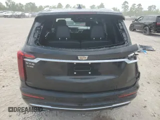 2023 Cadillac XT6 FWD Premium Luxury with VIN 1GYKPCRS6PZ127331, listed as a Copart auction lot 52951105 with 47,796 mi miles and Salvage Title. Bid and sale history available at carsss.com. Image 6.