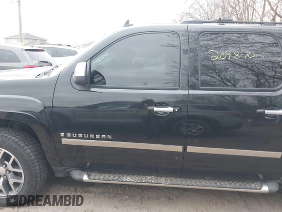 2008 Chevrolet Suburban 2LT with VIN 3GNFK16388G160010, listed as a IAAI auction lot 41153614 with 209,870 mi miles and . Bid and sale history available at DreamBid. Image 14.