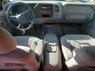 1999 Chevrolet Suburban with VIN 1GNFK16R4XJ483035, listed as a Copart auction lot 76666034 with 215,048 mi miles and Clean Title. Bid and sale history available at carsss.com. Image 8.